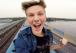 Ukranian vlogger Pasha Bumchik rides on top of a moving train